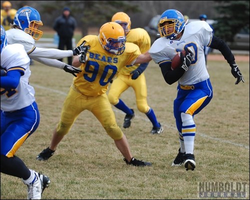 HCI Mohawk Treyton Luker (right) avoids the grasp of Josh Doidge of the Wynyard Bears during their playoff game in Humboldt on October 23.