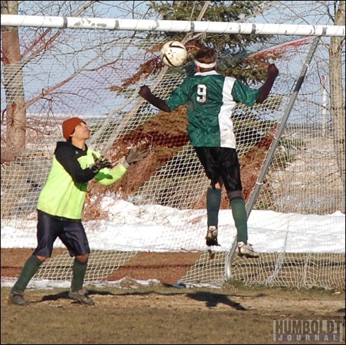 Michael Foy (9) of the Lake Lenore Lancers tries to head the ball into the Chief Poundmaker net during the 1A boys' soccer gold medal match on the weekend. Keeper Darryl Pederson made this save, but the Lancers won the game 3-1 to claim the provincial title.