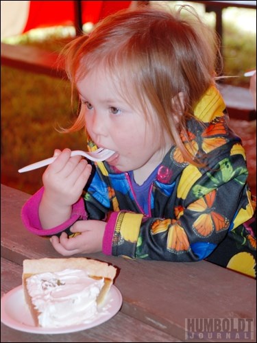 Kaycee Davies enjoys a piece of pumpkin pie at the Pilger Pumpkin Festival on September 25.