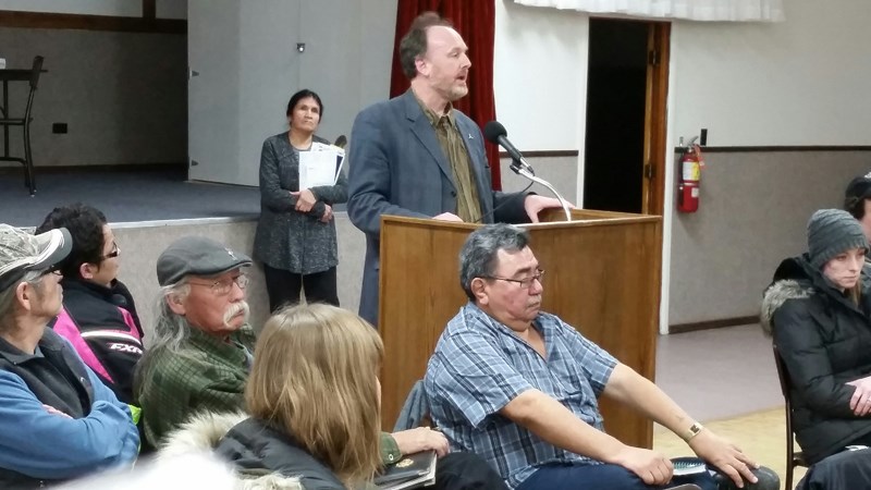 Mark Bigland-Pritchard, an applied physicist, asks why NWMO is still involved with Creighton when First Nations are opposed. Behind him is Eileen Linklater, a councillor with Peter Ballantyne Cree Nation.