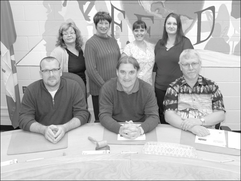 The new Flin Flon school board held its inaugural meeting Tuesday. Pictured (back, from left) are returning trustees Trish Sattelberger and Angela Simpson, newcomers Amy Sapergia Green and Leslie Fernandes; and (front) newcomer Andy Burbidge and returnees Murray Skeavington and Tim Davis.