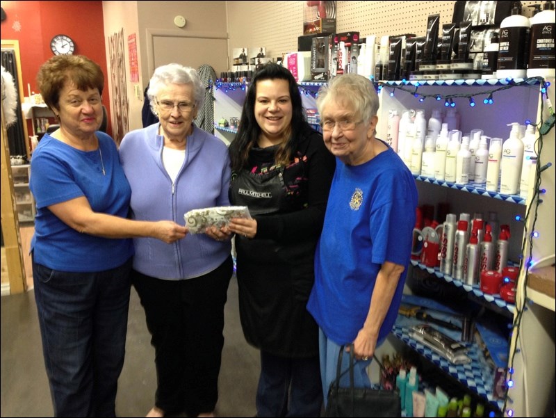 The Inner Wheel Club of Flin Flon recently donated $200 to Amie Roy’s local cancer wig program. Left to right are Joan Gohl, Grace Craig, Amie Roy and Margaret Smith.