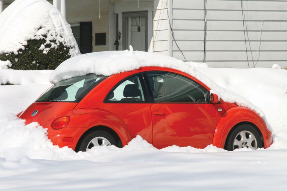 Snow covered car