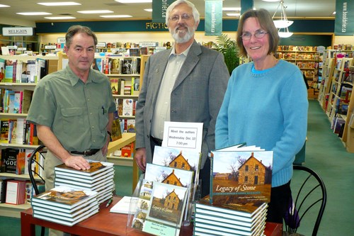 (l-r) Photographer Larry Easton of Wawota, archivist Frank Korvemaker and writer Margaret Hryniuk have collaborated on two books, 'Legacy of Stone' and 'Legacy of Worship' in an effort to preserve the province of Saskatchewan's architectural history. Both books are published by Coteau Press, Regina.