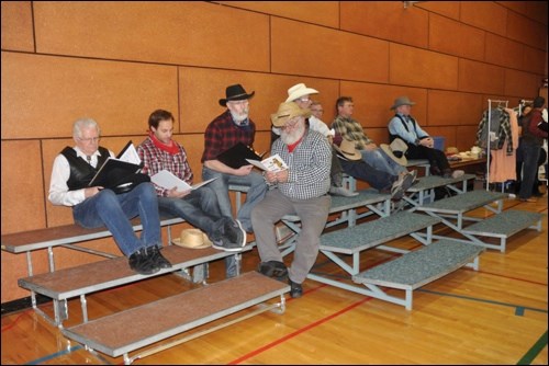 Members of the Meota Men’s Choir await their time to take to the stage for Home on the Range, a concert with the Community Youth Choir and the North Battleford City Kinsmen Intermediate Band. The concert was held Sunday at Third Avenue United Church’s Logie Hall before a full house. Entitled Home on the Range, the concert espoused a western theme. Photo by Jayne Foster