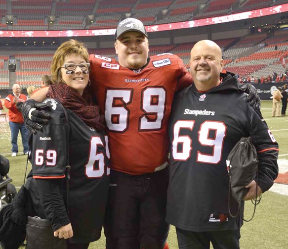 Former Weyburnite Brett Jones celebrated a win with his mom, Cheryl, and dad, Rob, at the 102nd Grey Cup held in Vancouver on November 30. Brett is a member of the Calgary Stampeders, who defeated the Hamilton Tiger Cats by a score of 20-16.