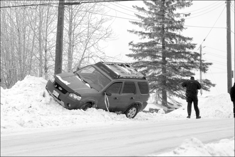There were no injuries or vehicle damage after a Ford SUV veered into the snow bank off Highway 10 near the Flin Flon Community Hall early Tuesday afternoon. RCMP said the driver tried to stop after the vehicle in front of her began sliding on an extremely slippery patch of road. No charges are pending. Police promptly requested the city spread sand on the section of road. RCMP remind the public to drive with added caution.