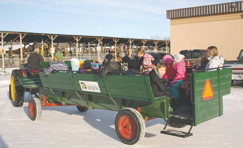 WDM Christmas Grade 1 students from Columbia School embark on a wagon ride during the Yorkton Western Development Museum’s annual Christmas programming. In addition to the wagon ride, local students from Kindergarten to Grade 6, participated in craft-making and treasure hunts at the museum.