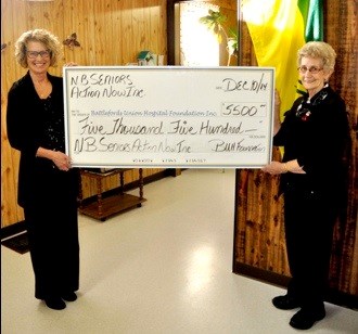 North Battleford Senior Citizens Action Now Inc. has once again made its annual Christmas donation to the Battlefords Union Hospital Foundation. The donation this year was in the amount of $5,500 to the Foundation’s fund. The presentation coincided with their annual Christmas dinner and members’ birthday party over the noon hour Dec. 10. The money was raised by the organization through the various events held by Action Now throughout the year. As well, the organization also receives a Sask Lotteries grant, some of which they are able to put back into the community.  Attending the cheque presentation at the Action Now Seniors’ Centre was Brenda Sparrow, chair of Battlefords Union Hospital Foundation, and Margaret Kemp, club president of Senior Citizens Action Now.  Photo by John Cairns