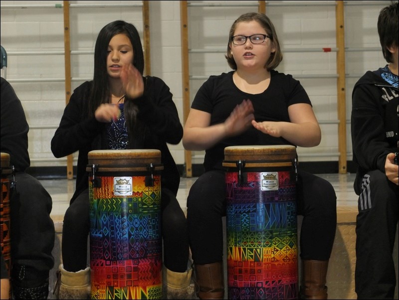 Alexis Grindle and Eden Morris of Ruth Betts Community School played jambay drums at last week’s winter band concert at École McIsaac School. The Dec. 10 concert combined the talents of grades 6, 7 and 8 students from Ruth Betts, McIsaac and Creighton.