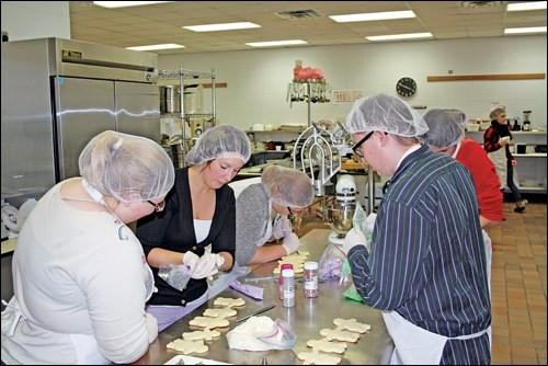 Students participate in the North Battleford Comprehensive High School after-school cooking program, supported by Cargill Cares. Photo submitted