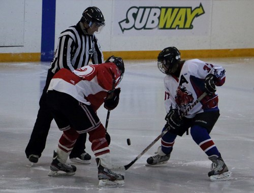 Assistant captain, Jake MacLeod faces off against the Radville Midgets in a game hosted in Carlyle on Friday, Dec. 12.