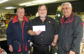 The Yorkton Antique Auto Association presented a cheque in the amount of $2000.00 to Captain Glen Fraser of the Salvation Army. Pictured above from left to right is Tom Cursons, Captain Glen Fraser and Harvey Litvanyi.