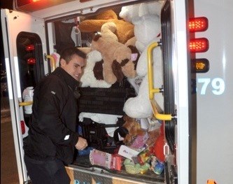 WPD Ambulance employees were among those who unloaded the toys collected in the Cram an Ambulance campaign into the offices of the Empty Stocking Fund on Dec. 17.