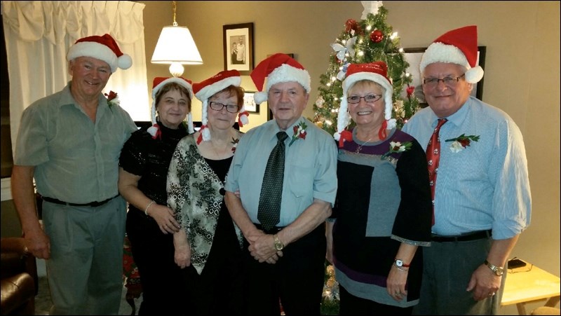 A December tradition marked its 30th anniversary this year. Flin Flon area friends  (pictured, from left) Don and Jeri Holmes, Iris and George Rideout, and Bev and Rob Scheifele  have been holding a pre-Christmas get-together each holiday season since 1984. Last week the friends enjoyed conversation and dinner at the Rideout home.