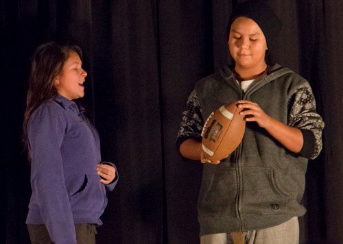 The grade seven and eight classes performed various skits including one about keeping New Year’s resolutions. Here Taivan M.’s character, Joe, keeps his resolution about being nicer to his little sister Jean, played by Emiah E.