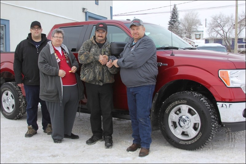 John Hrechka was the winner of the Lions Club annual Truck Draw on Christmas Day. Hrechka had bought six tickets – one for himself, one for his wife and four for his children and their significant others. His ticket was the winner on Dec. 25, and he walked away with a 2015 Ford F150. He was all smiles when he picked up his new ride at Northland Ford. Pictured alongside Hrechka are Lions vice-president Andy Wasylciw (right) and treasurer Monica Lone of the Lions Club, with Colby McConnell of Northland Ford.