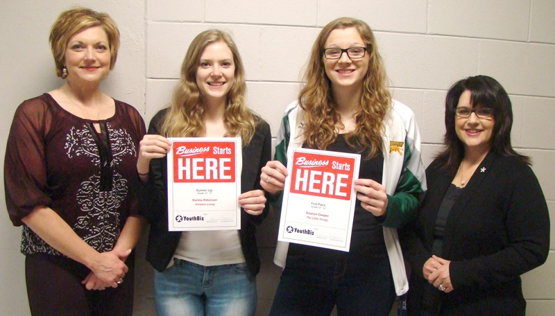 (L-R) Teresa LaFoy of Community Futures Sunrise presented awards to the winners in the Grade 10-12 category of the 2014 YouthBiz competition. First place went to student Kauron Cooper, with the runner up award going to Karina Peterson. Accompanying her students was teacher Margot Arnold of the Weyburn Comp School.