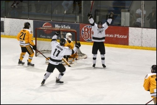 Jake McMillen celebrates the first of his two goals during a 6-3 win over the Estevan Bruins Friday.