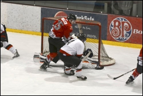Brett Miller cuts to the net during the Combines 10-4 win over Perdue Sunday.