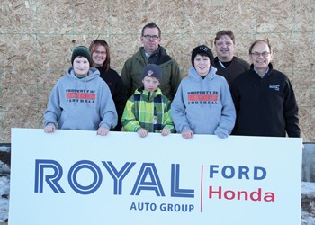 Royal Auto Group is on board for the Yorkton Community Clubhouse, donating $6,000 to the project. Pictured are (back row) Lynn Walker, Ed Witherspoon, Greg Schendel and Terry Ortynsky with Royal Auto Group. Local football players (front row, l-r) Dakota Walker (defensive line), Colby Witherspoon (wide receiver) and Dustin Schendel (tight end) will be some of the people who will benefit from the new facility.