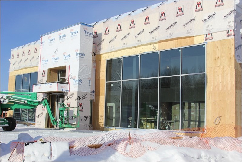Crews are steadily working towards the April 30 deadline for the new Northland Ford building. The building, on which construction began last year, will feature 10 bays and two showrooms. The multi-level building still has work to be completed both inside and out.