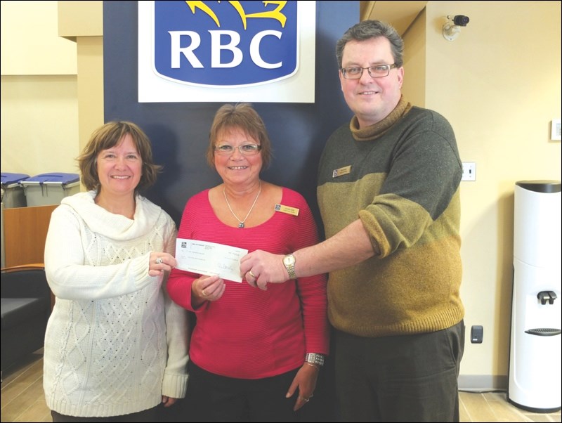 The RBC Foundation has donated $5,000 to the Flin Flon Community Choir for its upcoming production of Les Misérables. The choir’s Crystal Kolt (left) accepted the donation from RBC’s Charlene Pelly, client assistant officer, and Michael Yarowy, branch manager.