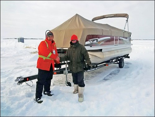 Despite harsh weather conditions all 50 prizes were handed out at the 19th annual North Stars ice fishing derby over the weekend. One hundred eighty people came to Jackfish Lake to test their angling abilities. First place went to Jason Wolf of Black Diamond, Alta. who won the 21-2S Vectra pontoon boat for his 6.65-pound pike. The boat retails for over $30,000. Saskatoon’s Mike McLeod won a seven-day Caribbean cruise with his second place 5.25-pound fish. Rounding out the top three was Jerry Banks of Fort Qu’Appelle who won a trip to Las Vegas with a 4.85-pound pike. About 1,560 holes were sold over the course of the day, and the 50/50 was nearly $6,500. Photo submitted
