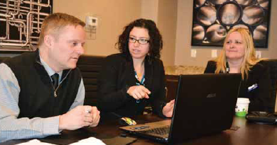 The APX Hotels Group held a remote quarterly sales meeting in the Alberta boardroom that is available for corporate business meetings at the new Hampton Inn by Hilton in Lloydminster. left to right: Jean-Pierre Burque, Lori-Jennison and Claire Janitz.
