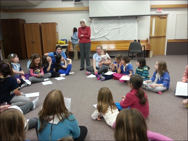 Barb Hopkinson of the Women’s Resource Centre met with the Sparks, Brownies and Guides, along with their leaders, last week. She was there to collect food and gently used books the girls donated to the centre’s lunch program. Hopkinson also told the girls about the program. At the same gathering, held Feb. 25 at Northminster Memorial United Church, the girls celebrated Thinking Day, a time to think about other children, and the meaning of Guiding and its impact.