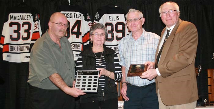 The Terrier Volunteer of the Year Award was presented to Delores and Pat Spreitzer centre. Making the presentation are, left Ron Pasloski, and club president Dave Baron, far right.