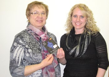 Congratulations to Yolanda Binder, winner in The News Review Mind & Body promotion, Yolanda received a $100 pre-paid credit card. Pictured above from left to right is Yolanda accepting her card from Renee Haas with The News Review.