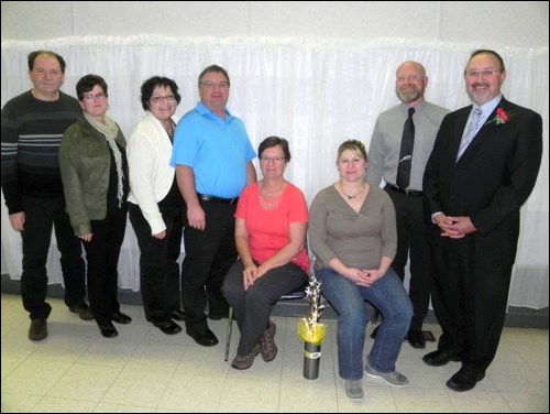 Committees honoured were senior men’s and women’s curling — Claude and Evelyn Combres, Donna and Bob Abel, seated Sharon Reiter; and Nicole Goldsworthy for World Junior A hockey and Carey Baker Don Robertson on behalf of the Unity Pee Wee provincial ball committee. Photos by Sherri Solomko