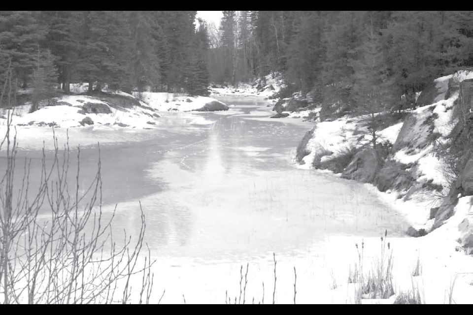 Mistik Creek just north of Cranberry Portage is slowly giving way to spring.