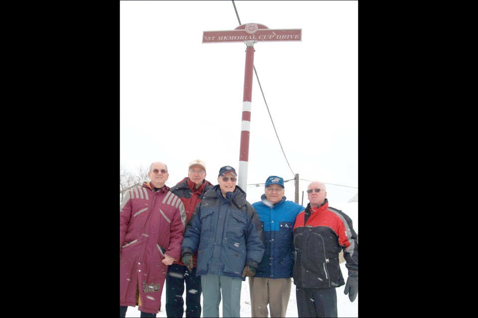 Ted Hampson (far left) with 1957 Memorial Cup champion teammates Rod Lee, Harvey Fleming, Mike Kardash and Cliff Lennartz at the unveiling of the sign proclaiming the Whitney Forum as 57 Memorial Cup Drive in 2007.