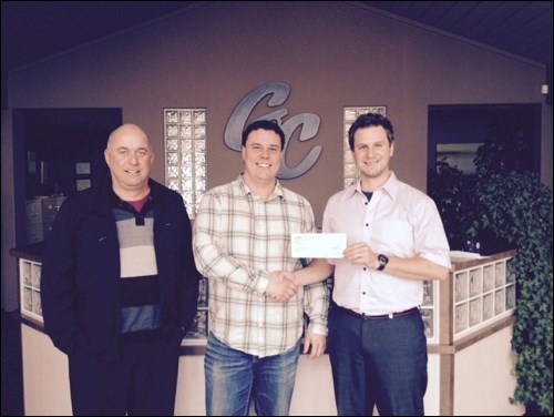 Hat Trick for KidSport — April 9, Ryan Moe, area manager of G&C Asphalt and G&C Ready Mix North Battleford presented a $12,000 cheque to Rob Rongve and David Schell (co-chairs) of KidSport Battlefords. The proceeds are from an event held in Swift Current this year called the Colas Cup, a travelling hockey tournament that hosts participants from Western Canada and Alaska. It's organized by a group of companies and this year the three hosting companies were out of Swift Current (Delta Aggregate; Westland Concrete), North Battleford (G&C Asphalt and G&C Ready Mix) and Estevan (Souris Valley Paving). All the funds raised at the tournament are matched by those companies to be donated to their charity of choice, which they have chosen to be KidSport. Because of the location of those three companies the funds raised were split among the three 3 communities. Photo submitted