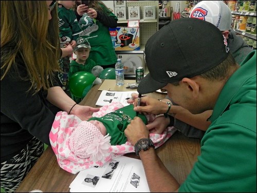 All kinds of interesting Rider items were signed by Chris Milo and Spencer Moore during their autograph session at Delta Co-op grocery store in Wilkie.