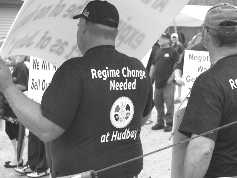 IAM members protest at a 2012 visit to Flin Flon by Hudbay officials.