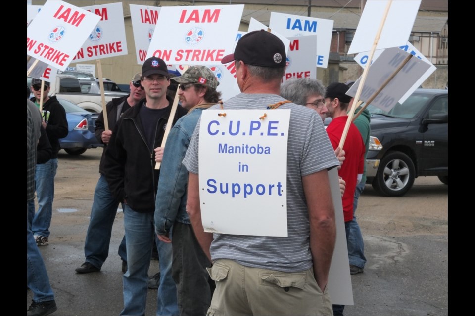 A CUPE Manitoba member joined the picket line in support of IAM Local 1848.