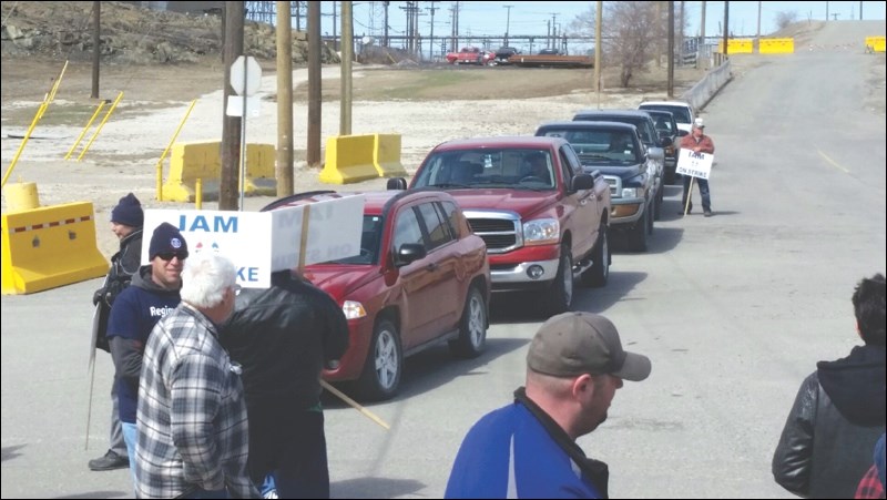 Picketers delay traffic entering Hudbay property near the main gate.