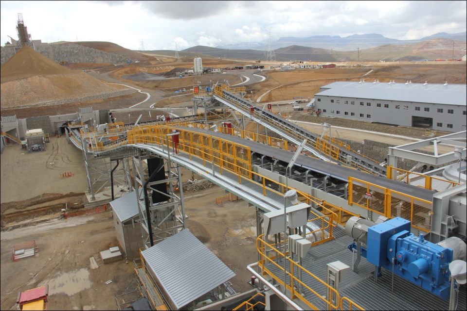 Crushed ore from the Constancia mine travelling on stockpile conveyors to be processed.
