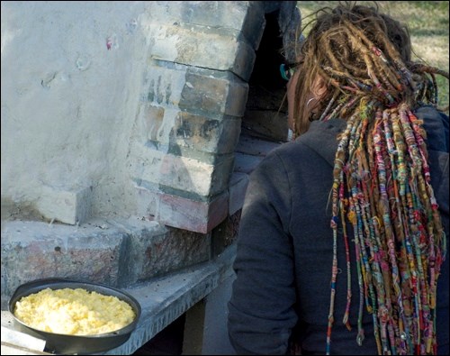 Mariann Taubensee putting in some cornbread for the walkers.