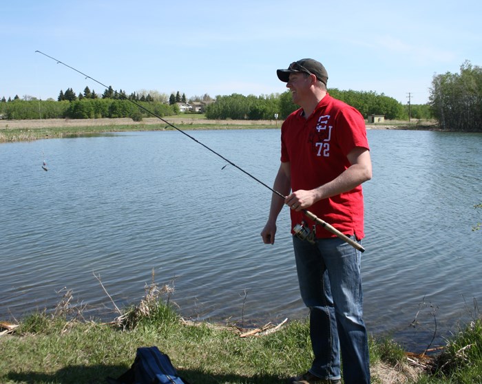 Fishing Parkland Shorelines - City trout pond attracts attention