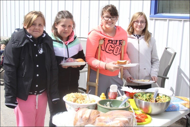 Dani Dollard (left), Tori Holmstrom and Charyse Jackson (far right) joined Jerilyn Wood