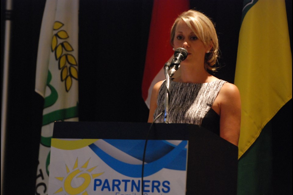 Rachel Trann, executive director of PARTNERS Family Services and one of the organizers for the event, spoke a few words at the Amanda Lindhout banquet on June 10.