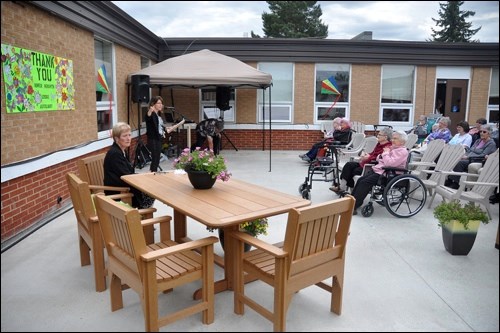 Kelly Day, facility manager at River Heights Lodge, thanked the auxiliary group for making the new patio a reality.
