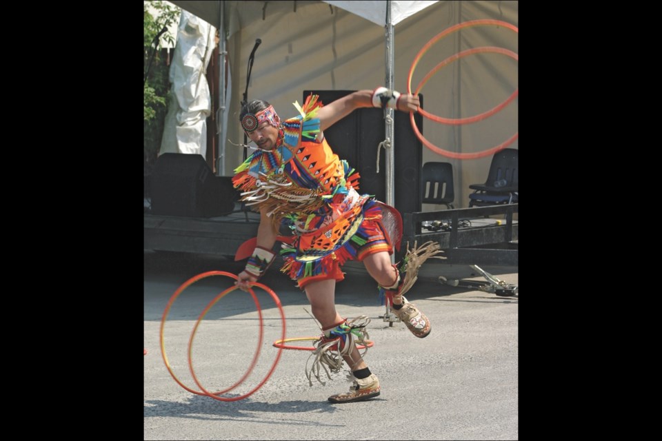 World champion hoop dancer Dallas Arcand performed.