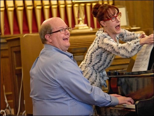 Who says classical music isn’t fun? At a concert by the staff of the Summer School for the Solo Voice in North Battleford Tuesday, pianist Chris Kelly or Saskatoon and mezzo soprano Bonnie Cutsforth-Huber, formerly of Maidstone now of Pennsylvania, laugh during a page turn of Franz Liszt’s Hungarian Rhapsody No. 2 a la Daffy and Donald Duck, a duet with Bernadette Fanner (see inside for more photos), much to the audience’s delight. Photos by Les Richardson