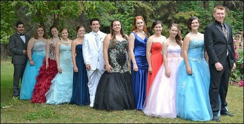 From left to right, the graduating class of HHS, 2015, are Jesse Cadrain, Breanna Wouters, Shaylyn McConnell, Emily Levasseur, Kalie Nordell, Anthony Cole, Shyla Hamel, Kennedy Schaefer, Brittany Bec, Sabrina Cadrain, Chelsea Hamel and Dallon Becotte. Photos by Brenda Pollard