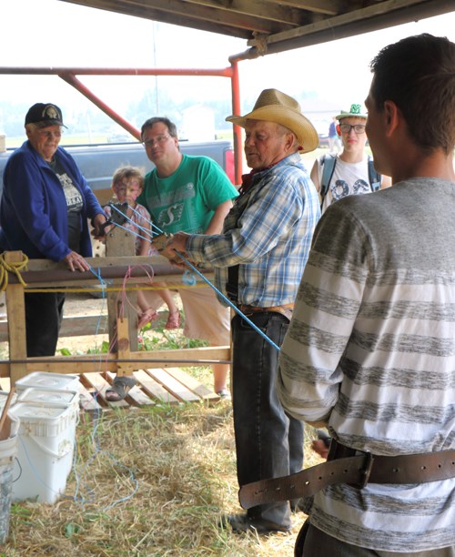 Albert Hanson of Ceylon demonstrates how rope was made during the Arcola Antique Ag Daze.
